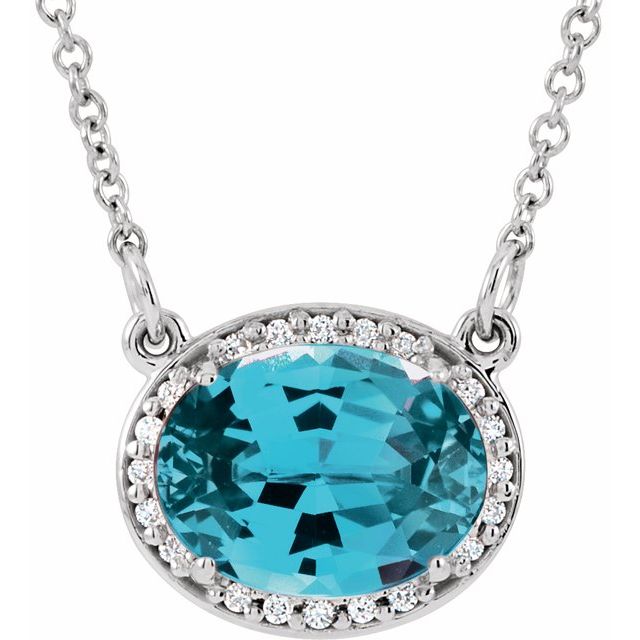 swiss blue topaz diamond halo necklace in 14k white gold