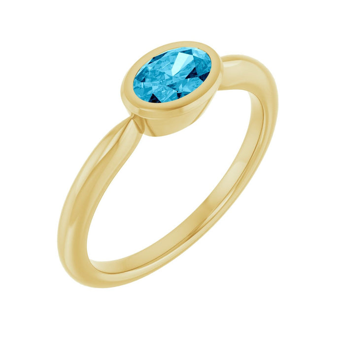Oval Solitaire Natural Aquamarine Ring (6x4 mm) in 10K Yellow Gold