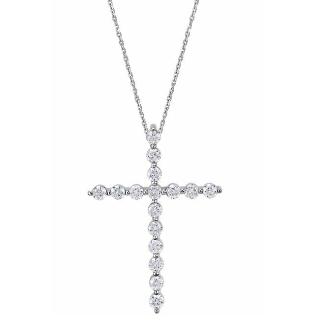 half-carat diamond cross pendant in 14k rose gold
