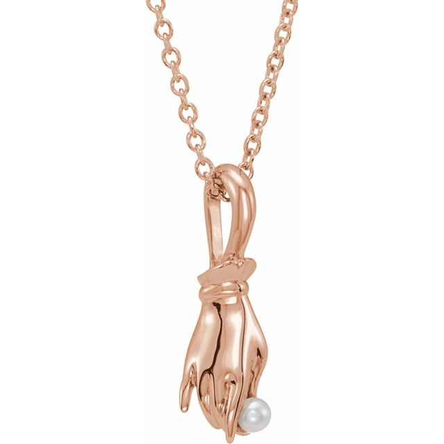 seed pearl buddha hand necklace in 14k rose gold