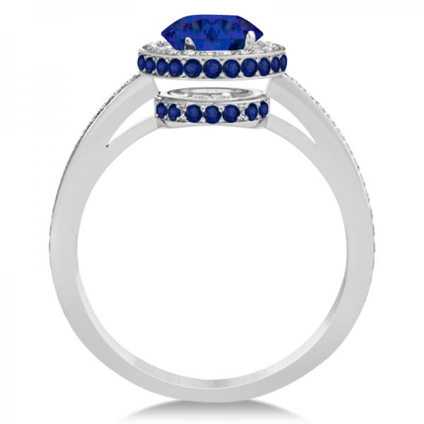 oval diamond and sapphire engagement ring vertical