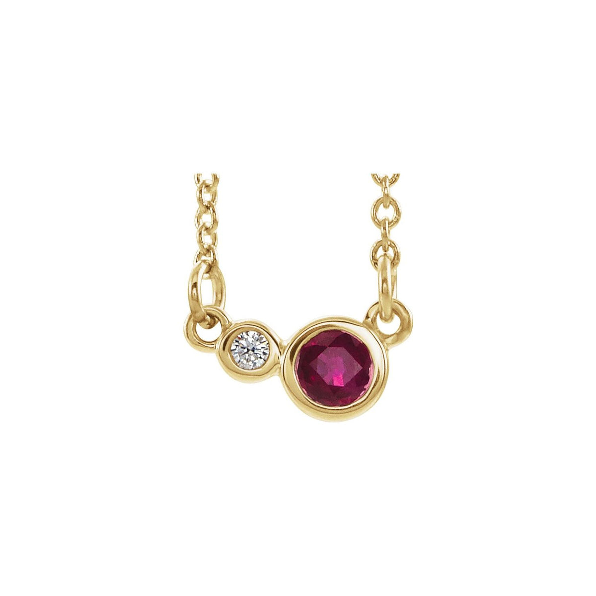 14K Yellow Gold bezel-set station ruby necklace with a 4 mm round natural ruby bezel beside a natural diamond bezel