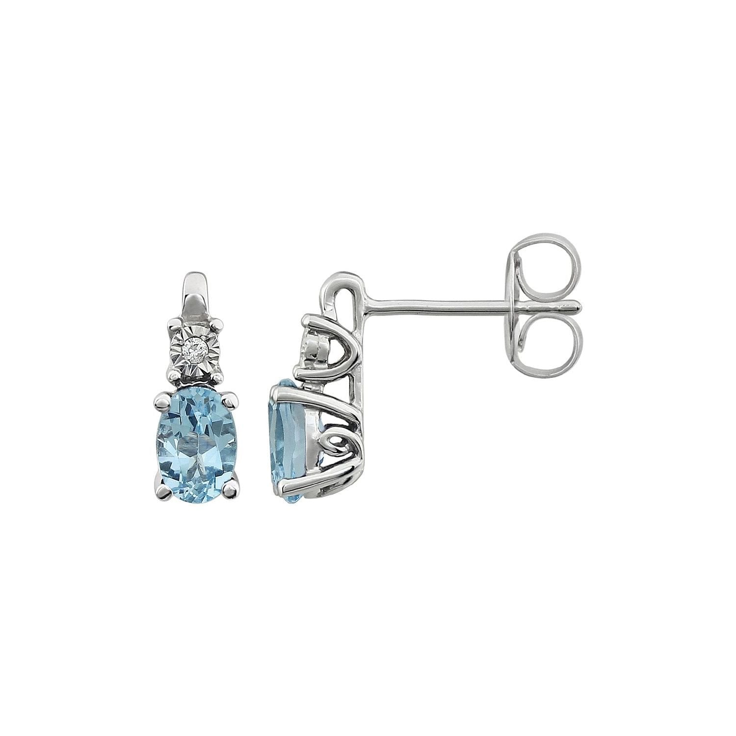 oval sky blue topaz earrings in 14k White Gold
