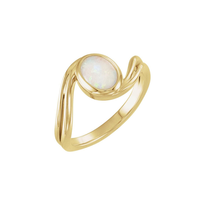 oval white opal ring in 14k Yellow Gold