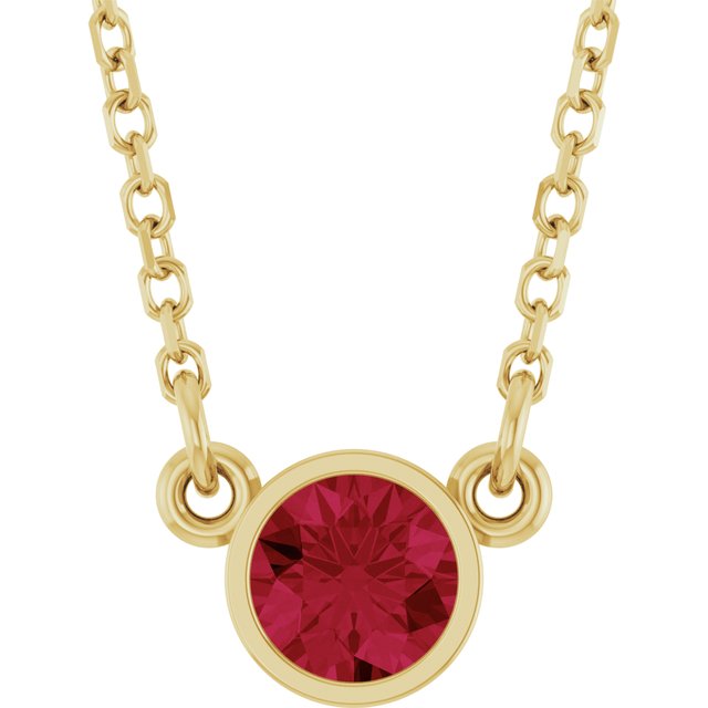 july ruby round solitaire necklace in 14k yellow gold
