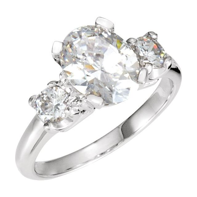 Oval Pink Sapphire Three-Stone Engagement Ring