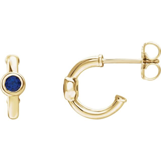lab-grown blue sapphire huggie hoop earrings in 14k yellow gold