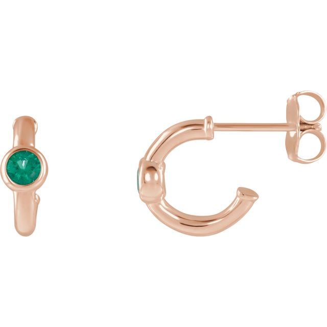 emerald huggie hoop earrings in 14k rose gold