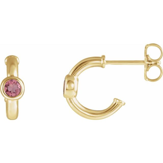 pink tourmaline huggie hoop earrings in 14k yellow gold