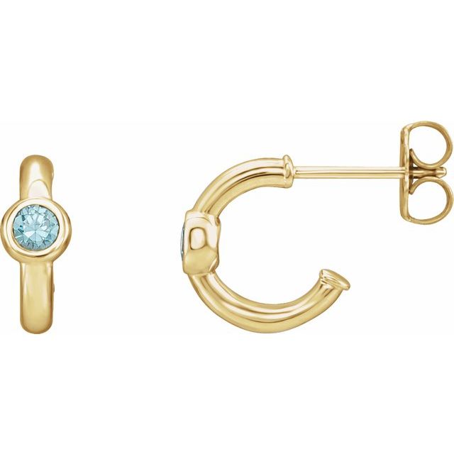 blue zircon huggie hoop earrings in 14k yellow gold