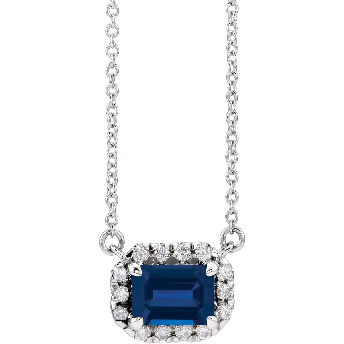 1/8 ct Diamond Halo Natural Blue Sapphire Pendant (5x3 mm)