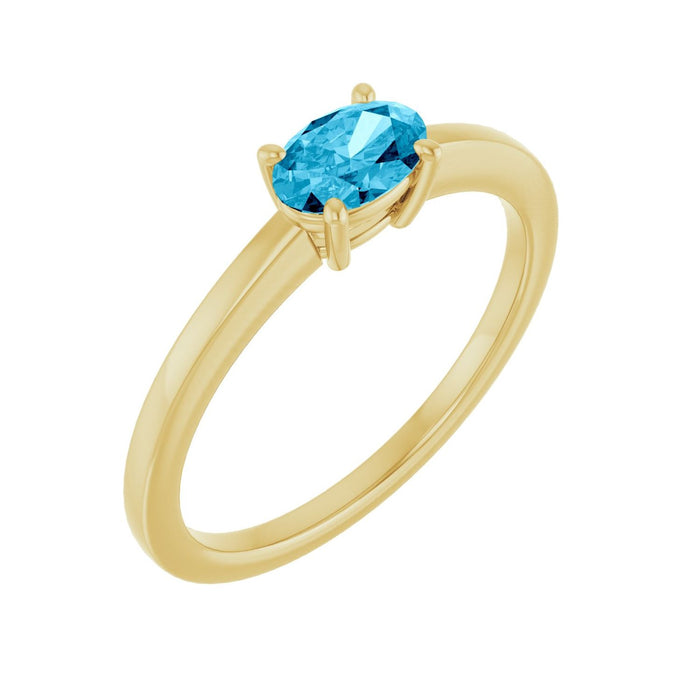 Oval Solitaire Natural Aquamarine Ring in 14K Yellow Gold