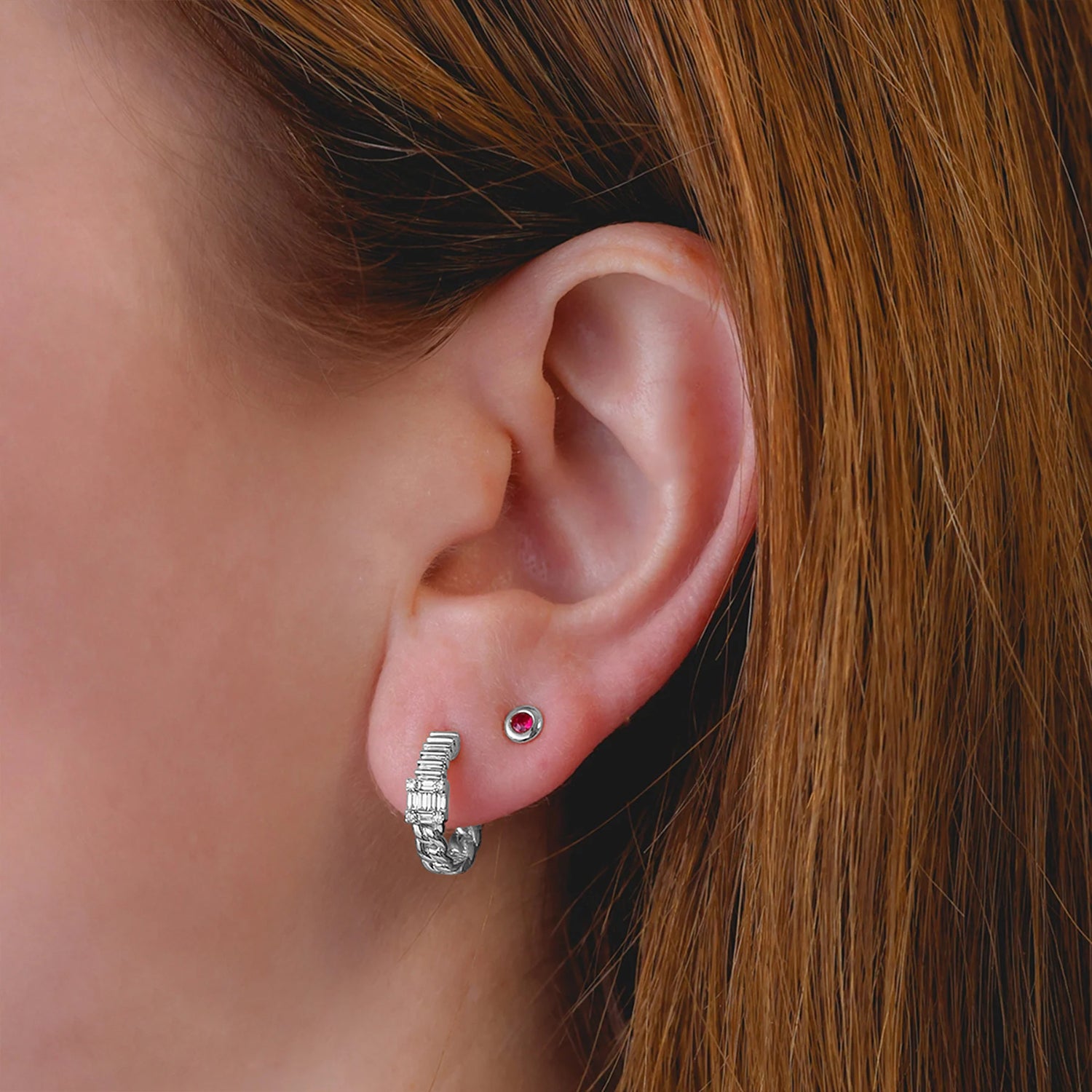 Round Ruby Bezel Stud Earrings in 14k White Gold (0.10ct) on Woman