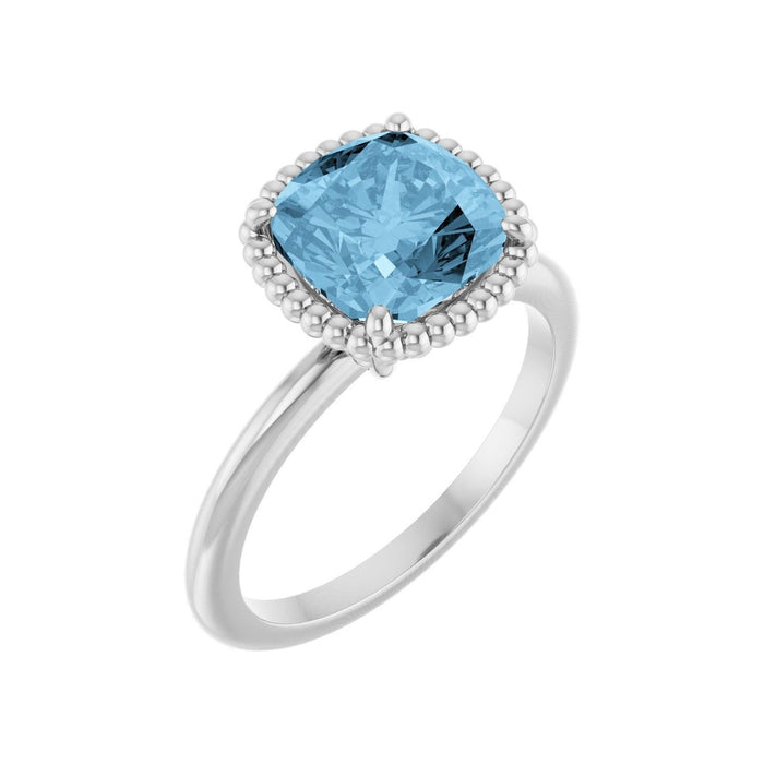 Cushion Solitaire Blue Topaz Ring in 14K White Gold