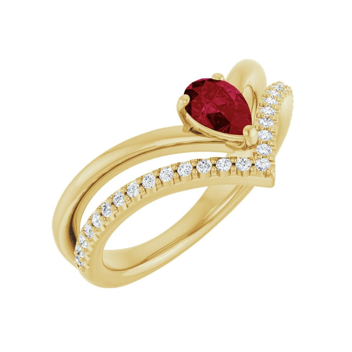 natural pear ruby & diamond ring in 14k Yellow Gold