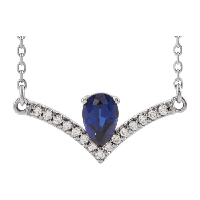 14K White Gold natural blue sapphire pear sapphire at the apex of a diamond-pave chevron